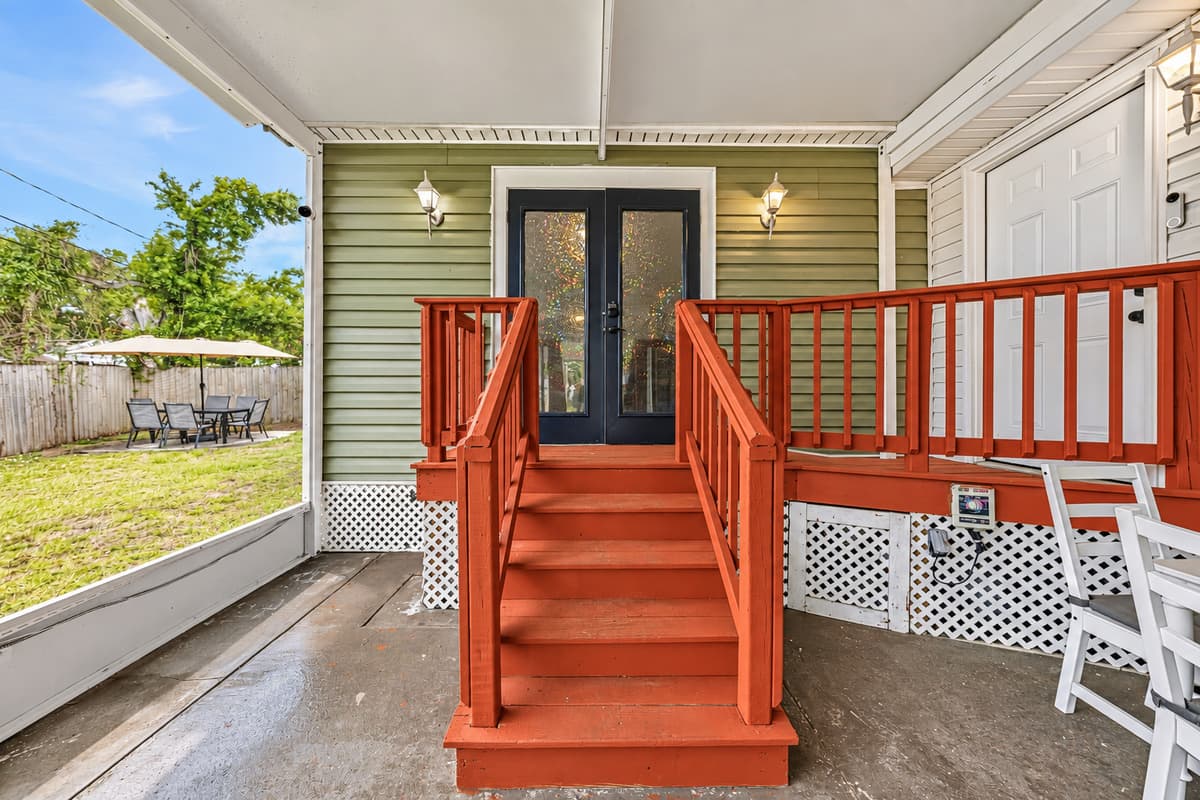 Backyard access with stairs leading to the patio—easy transition between outdoor spaces.