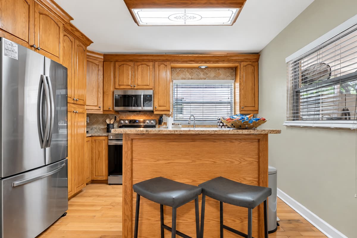 Equipped with the latest appliances, this kitchen is a chef's dream come true.