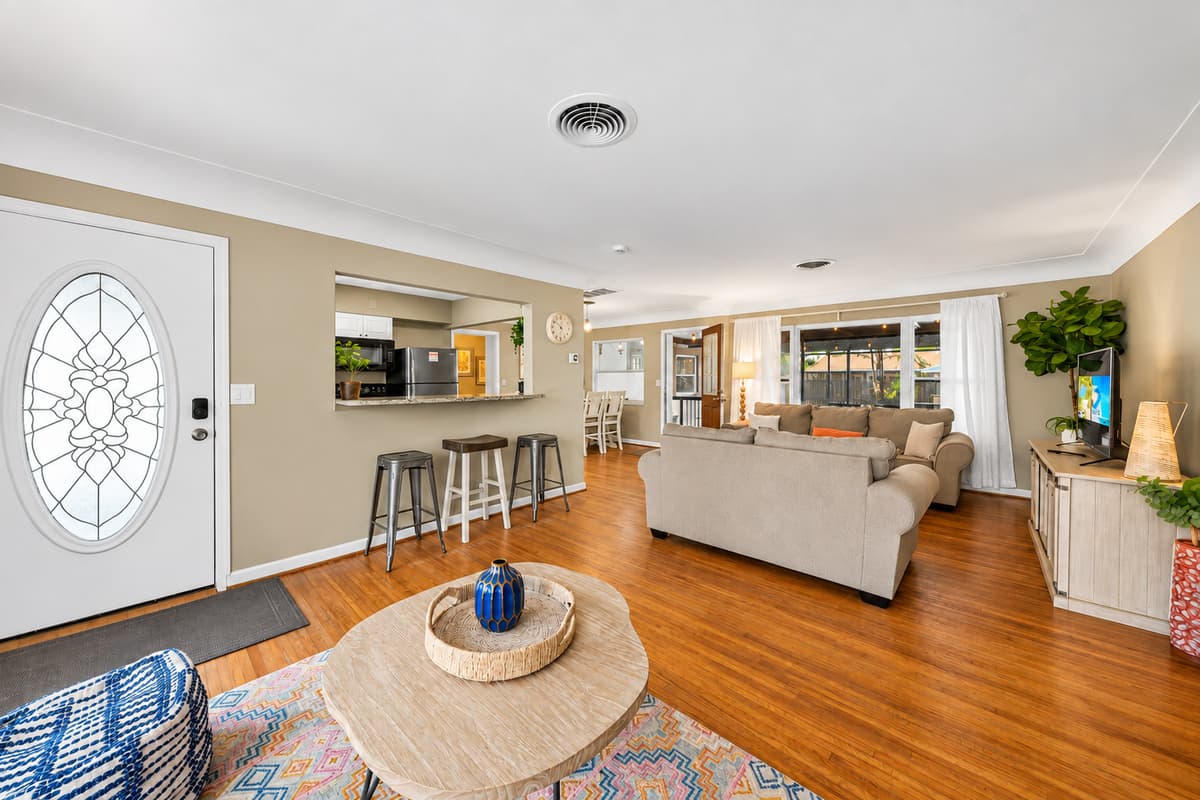 Beautifully designed open-concept interior with stylish furnishings and abundant natural light.