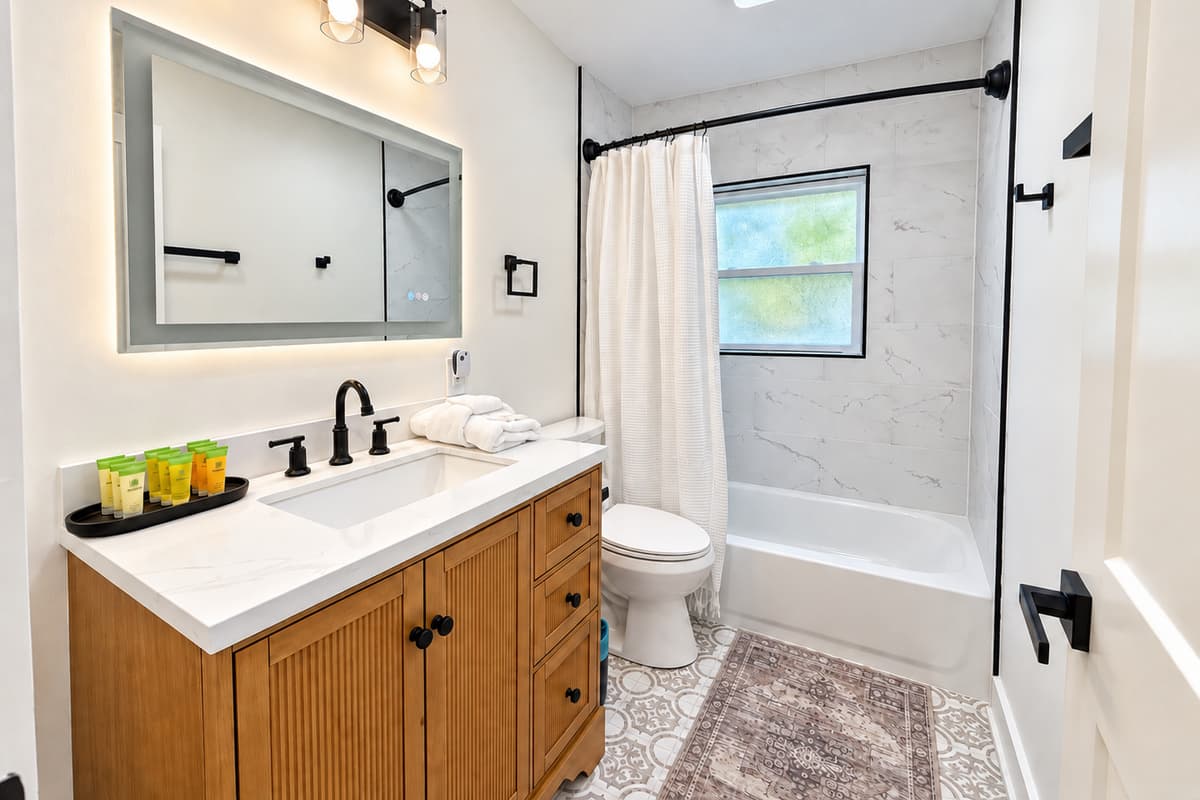 Bathroom 2 with a single vanity and bathtub/shower combination.
