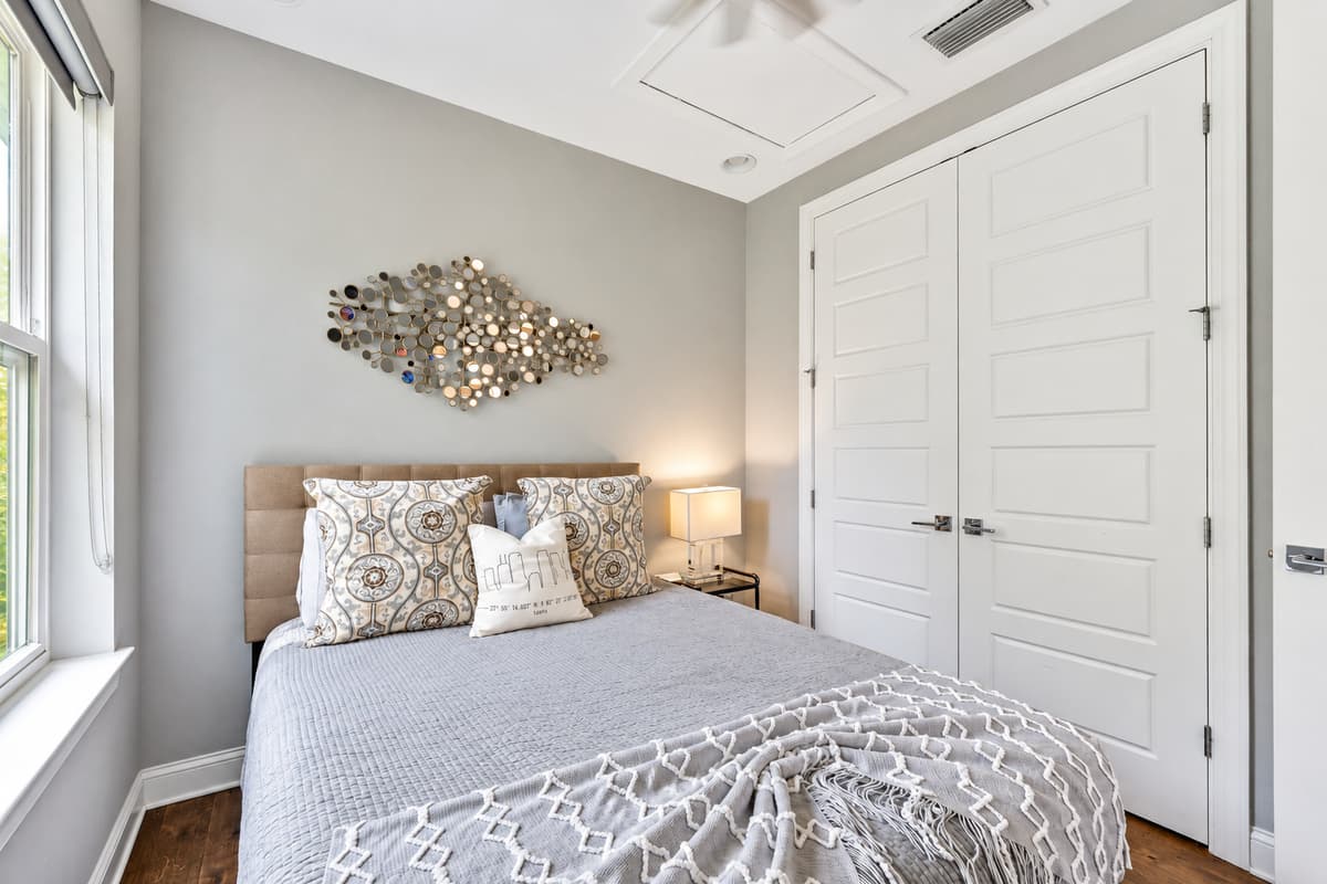 The centerpiece of the room is a welcoming queen-size bed, ensuring ample comfort for a peaceful night's rest.