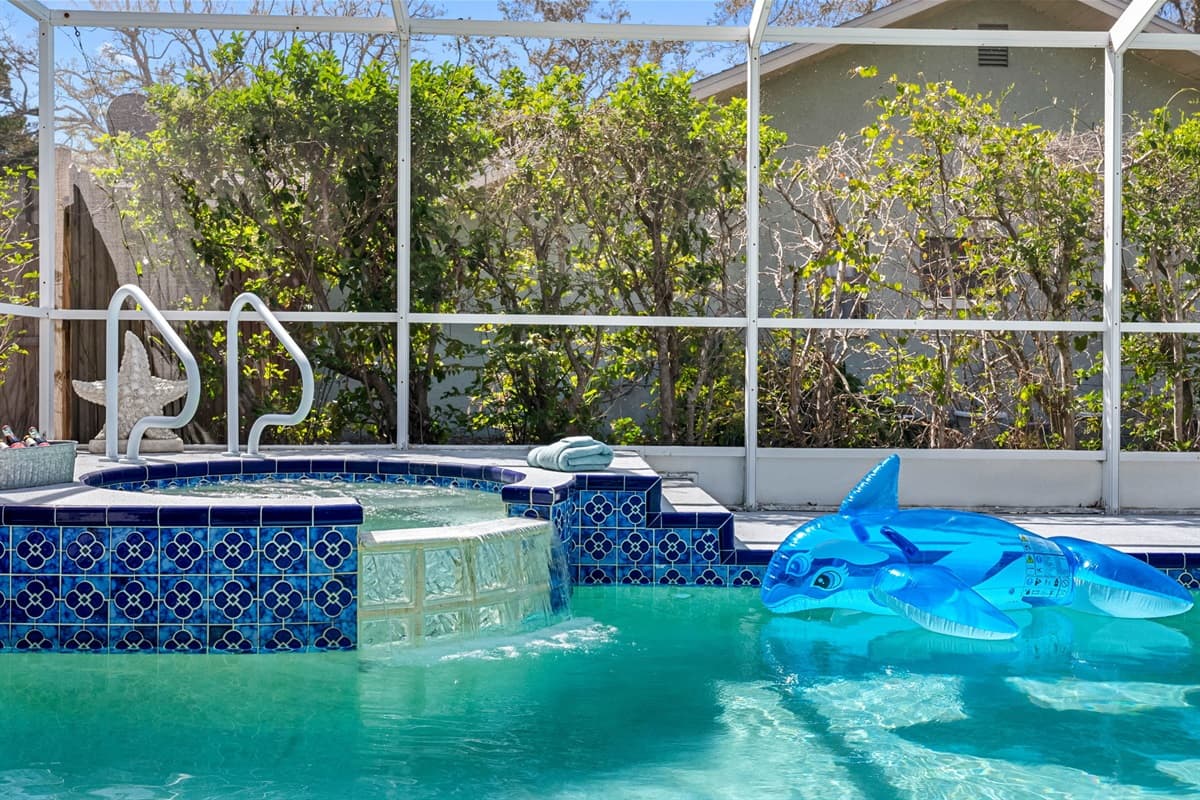 Whether you're entertaining guests, spending quality time with loved ones, or simply enjoying a quiet moment to yourself, this screened-in pool and patio area is sure to become one of your favorite parts of your stay.