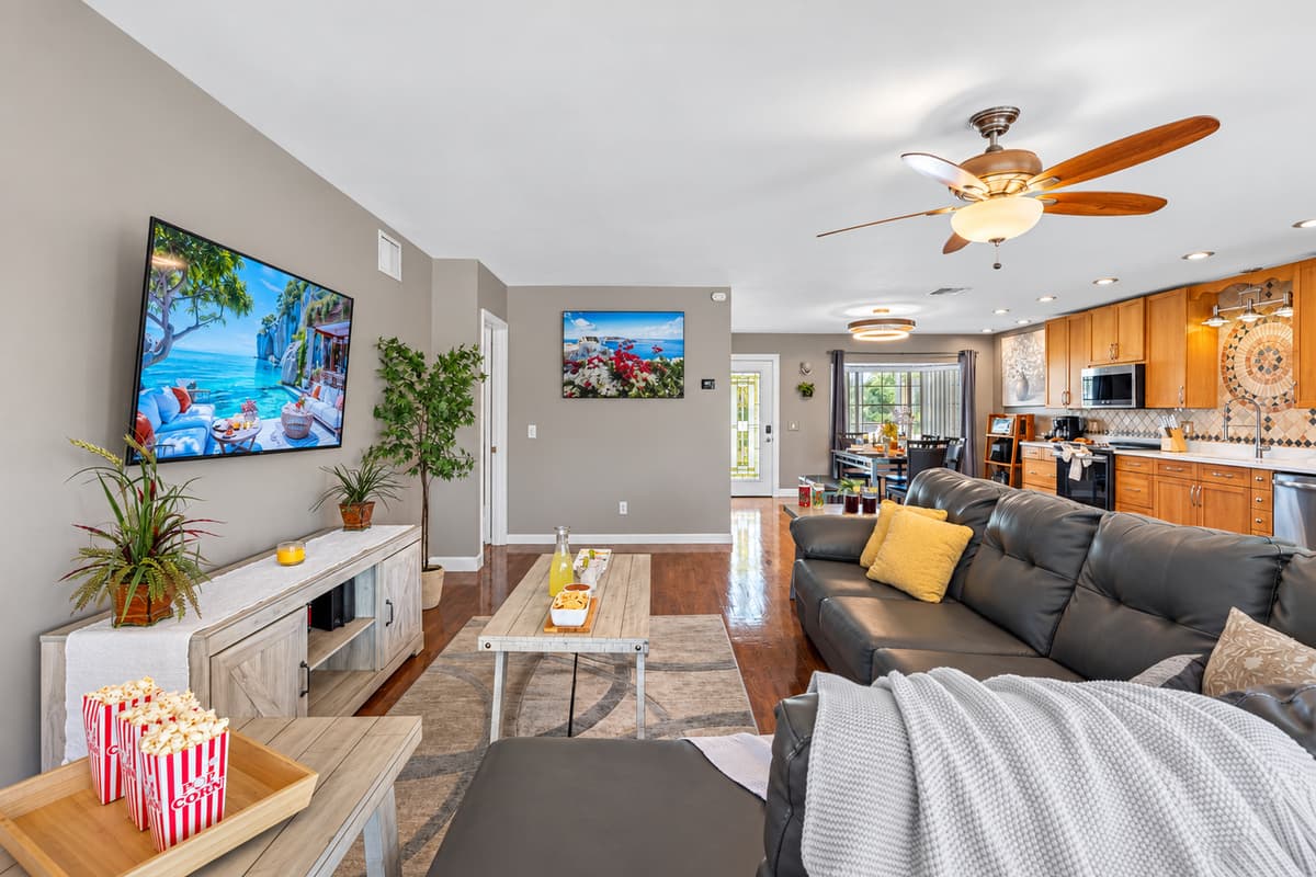 Designed with comfort in mind, the roomy sectional and multiple tables make this the ultimate hub for family activities.