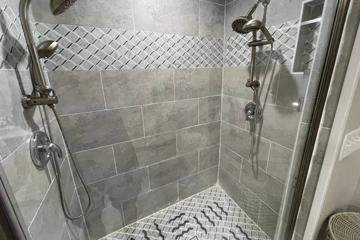 The walk-in shower is both accessible and functional, making it the perfect space to rejuvenate after a long day of activities.