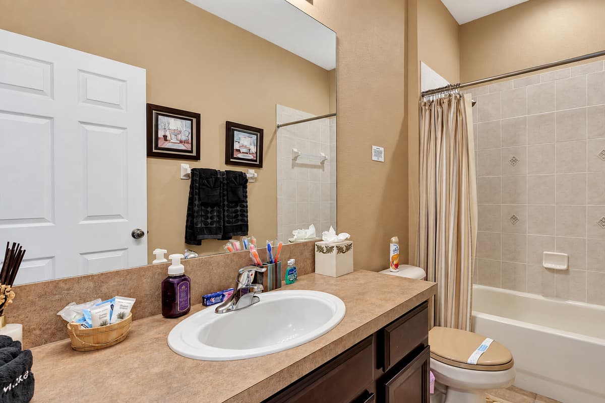 Exquisite countertops, ample storage, and beautifully crafted mirrors invite you to pamper yourself with ease.