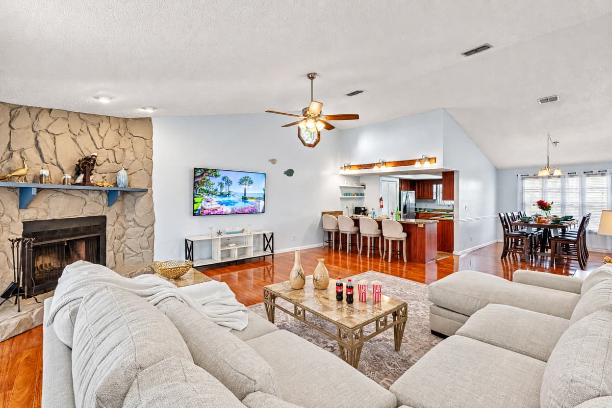 A beautifully designed lounge area with soft neutral tones, rich hardwood floors, and a calming atmosphere—perfect for morning coffee or winding down after a day of adventure.