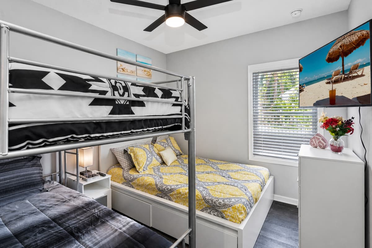 This bedroom is perfect for a small family or a group of friends who wants to hang out and sleep in one room. It is very spacious and has a very nice view.