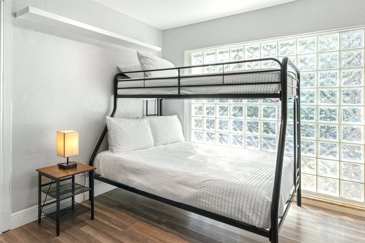 An adjoining bunk space offers extra sleeping arrangements for kids or guests.