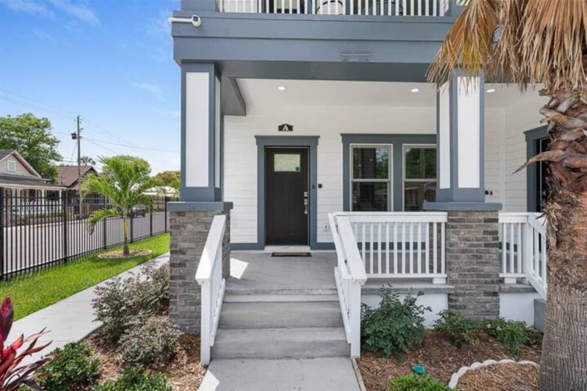 This entryway will welcome you and make you feel at home once you reach the property that has beautiful plants and a well maintained lawn. If you like what you see, send us an inquiry!
