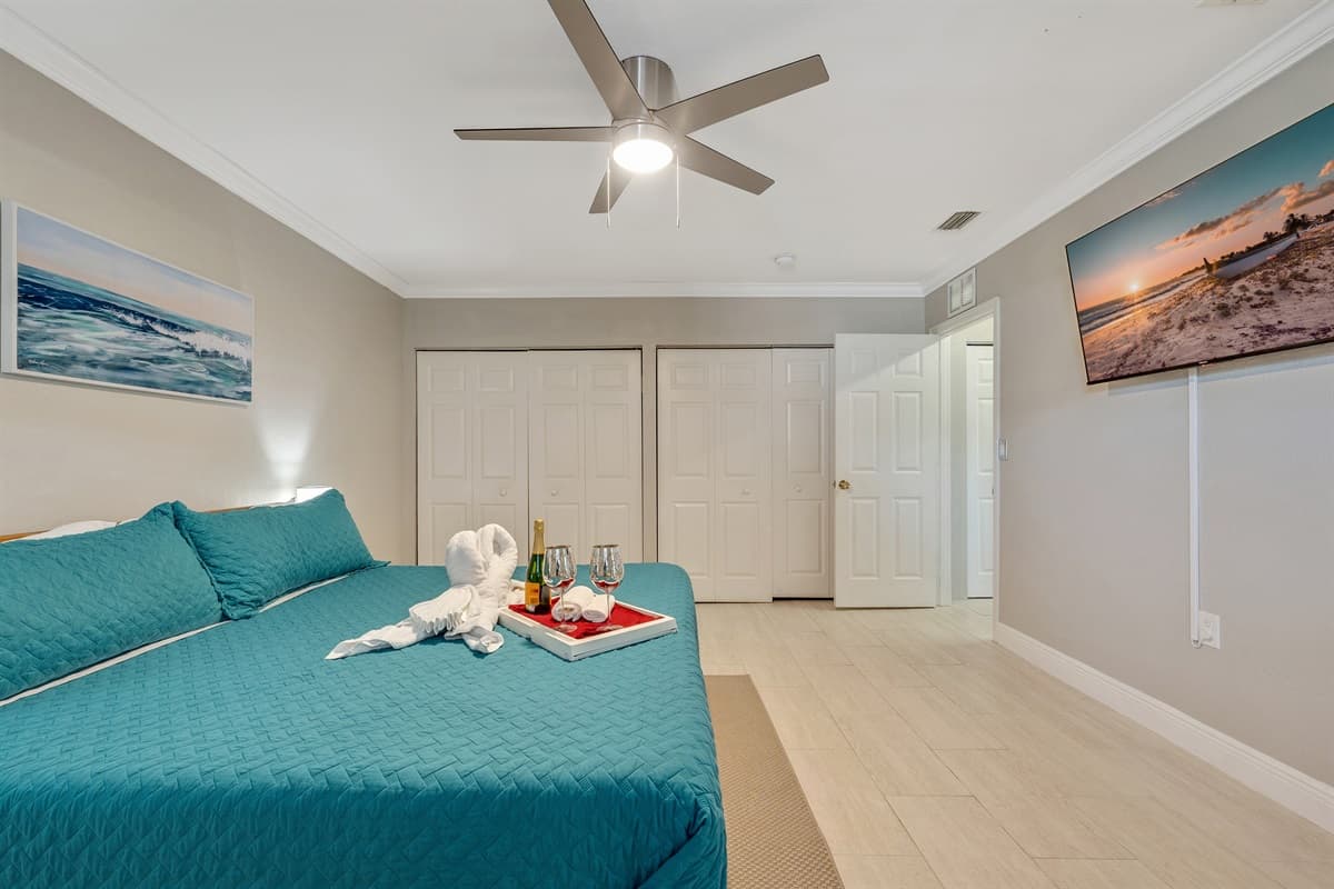 The spacious and inviting king bed serves as the focal point of the room, ensuring a restful sleep experience for a truly rejuvenating stay.