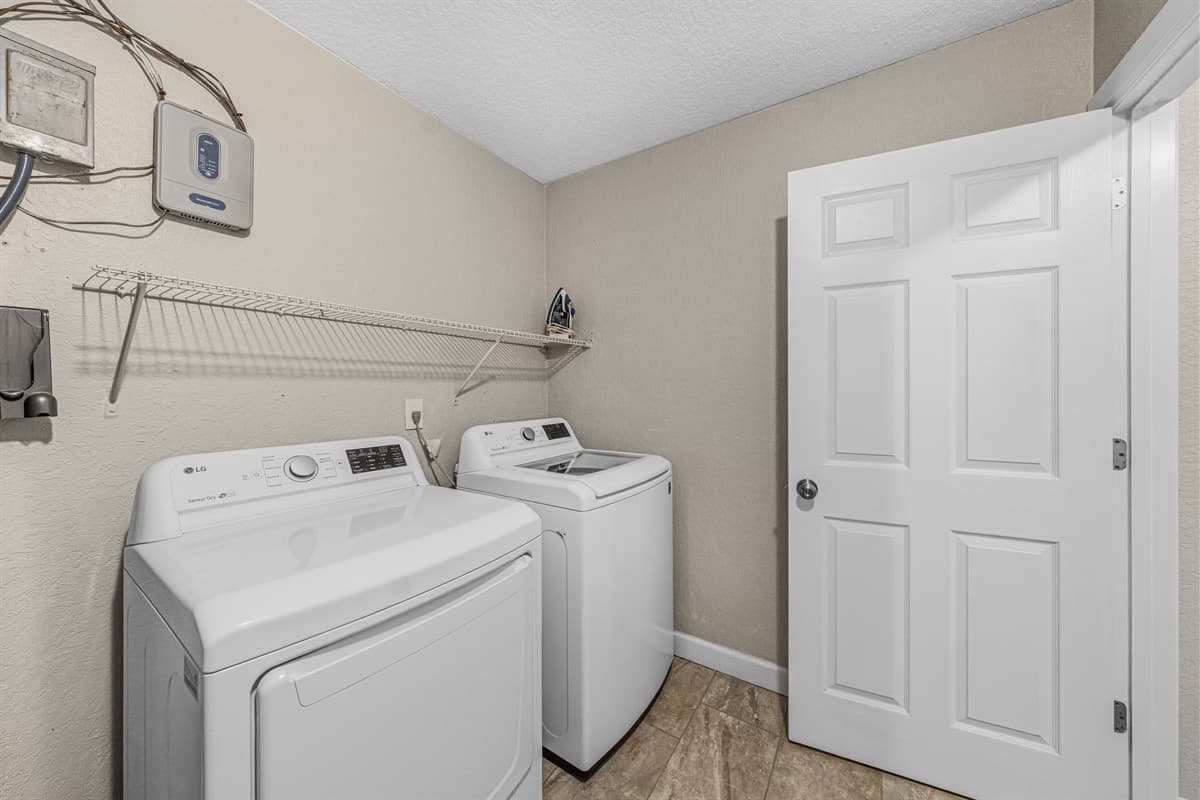 Laundry room with washer and dryer—perfect for longer stays and added convenience.