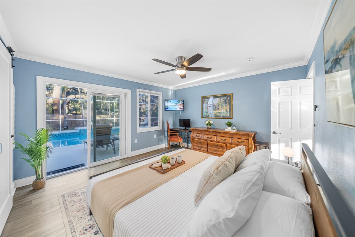This king bedroom feels both elegant and welcoming, providing a tranquil space to rest and recharge.