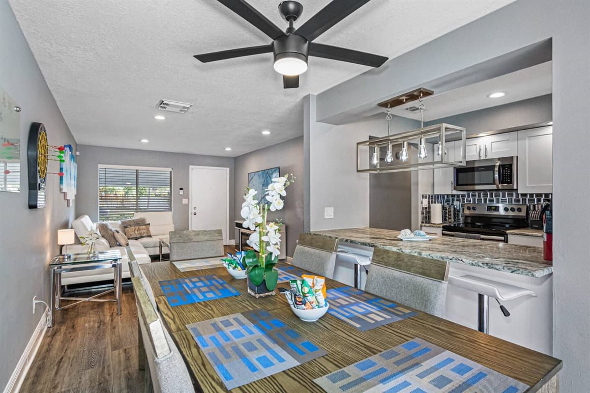 This elegant dining table can seat 6 people comfortably. Share great memories while eating freshly made meals in our modern kitchen! If you like sharing stories with family and friends, send us a message now!