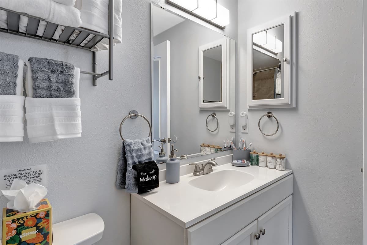 Indulge in comfort and convenience in our stylish bathroom.