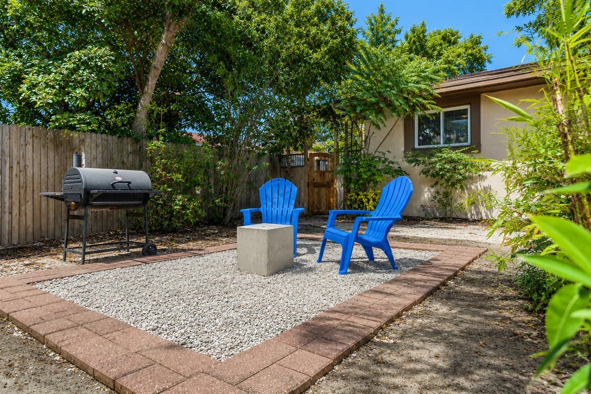 Inviting outdoor patio space perfect for grilling, relaxing, and enjoying the quiet backyard setting.