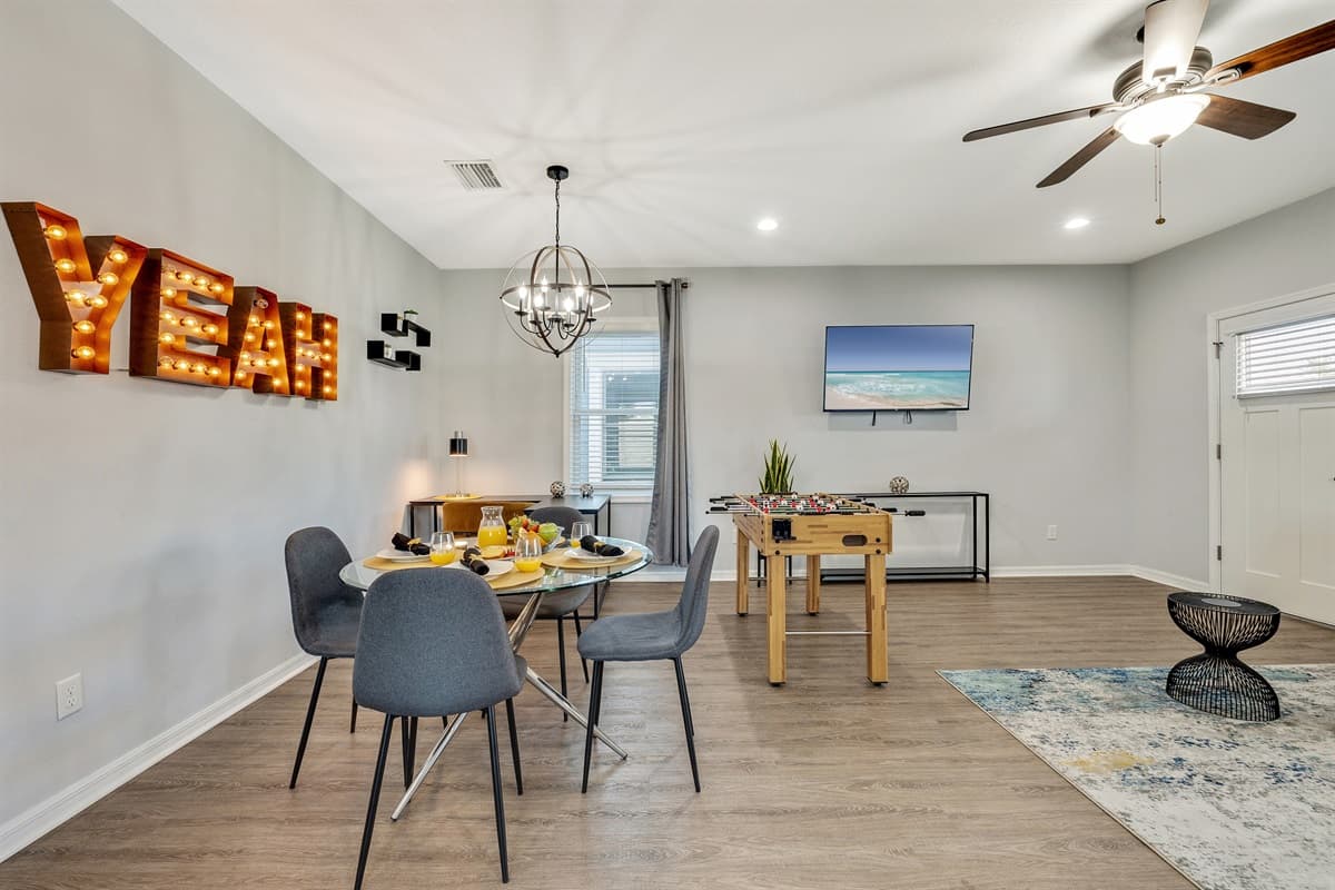 The attention to detail extends beyond the table, with subtle decor elements adding to the overall charm of the room.