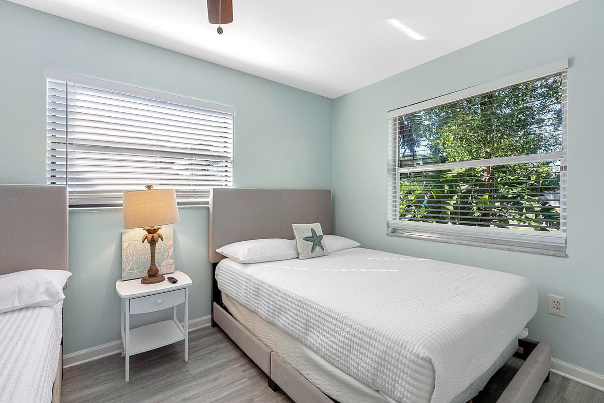 This bedroom is designed with comfort and convenience in mind, making it an excellent choice for larger groups or families traveling with children.