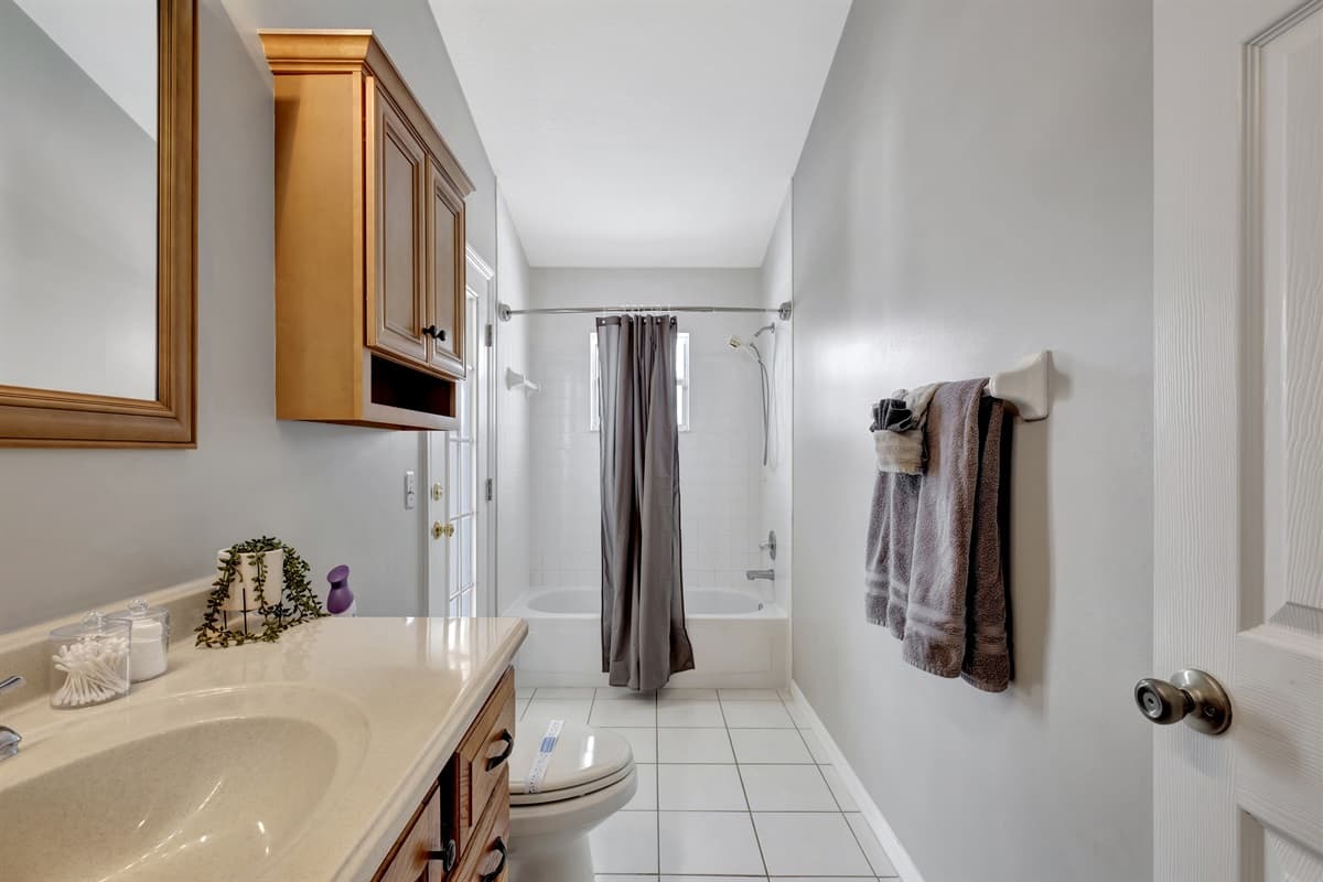 Indulge in the epitome of luxury as you step into our exquisite bathroom, where a magnificent bathtub takes center stage, inviting you to surrender to its soothing embrace.