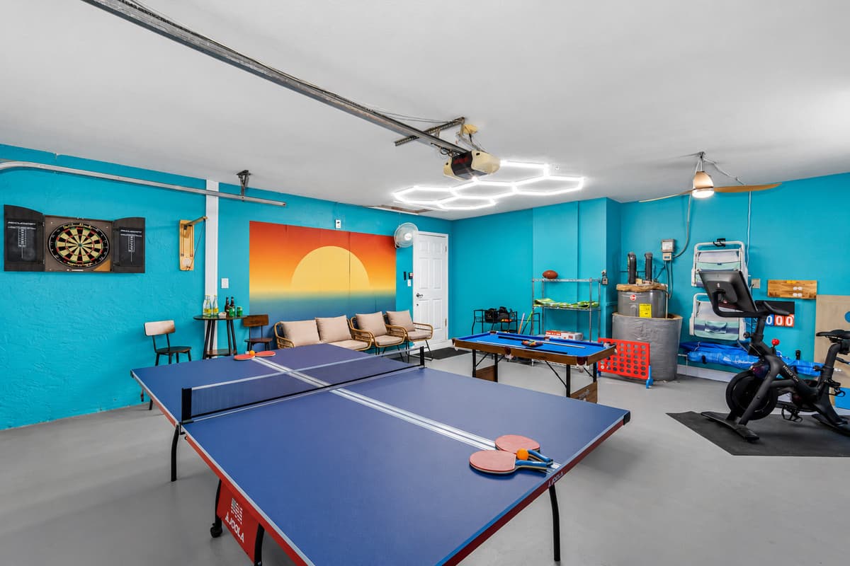 A bright, beachy game room complete with games, seating, and vibrant décor for the perfect indoor escape.