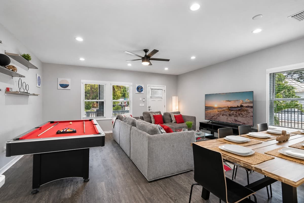 As you step into this enticing recreational area beside the living area, the pool table convertible to a ping pong table takes center stage, inviting you to embrace the thrill of gaming.