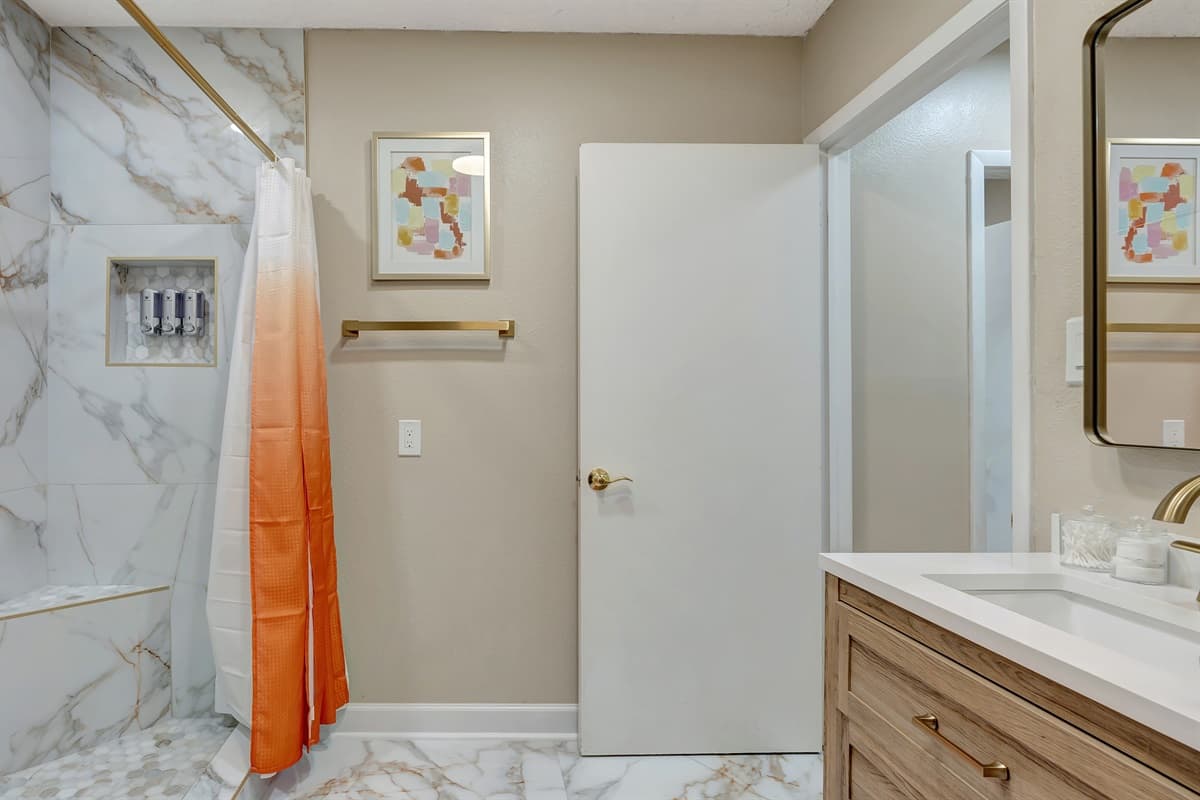The walk-in shower awaits, a haven of relaxation and rejuvenation, promising a shower experience like no other.