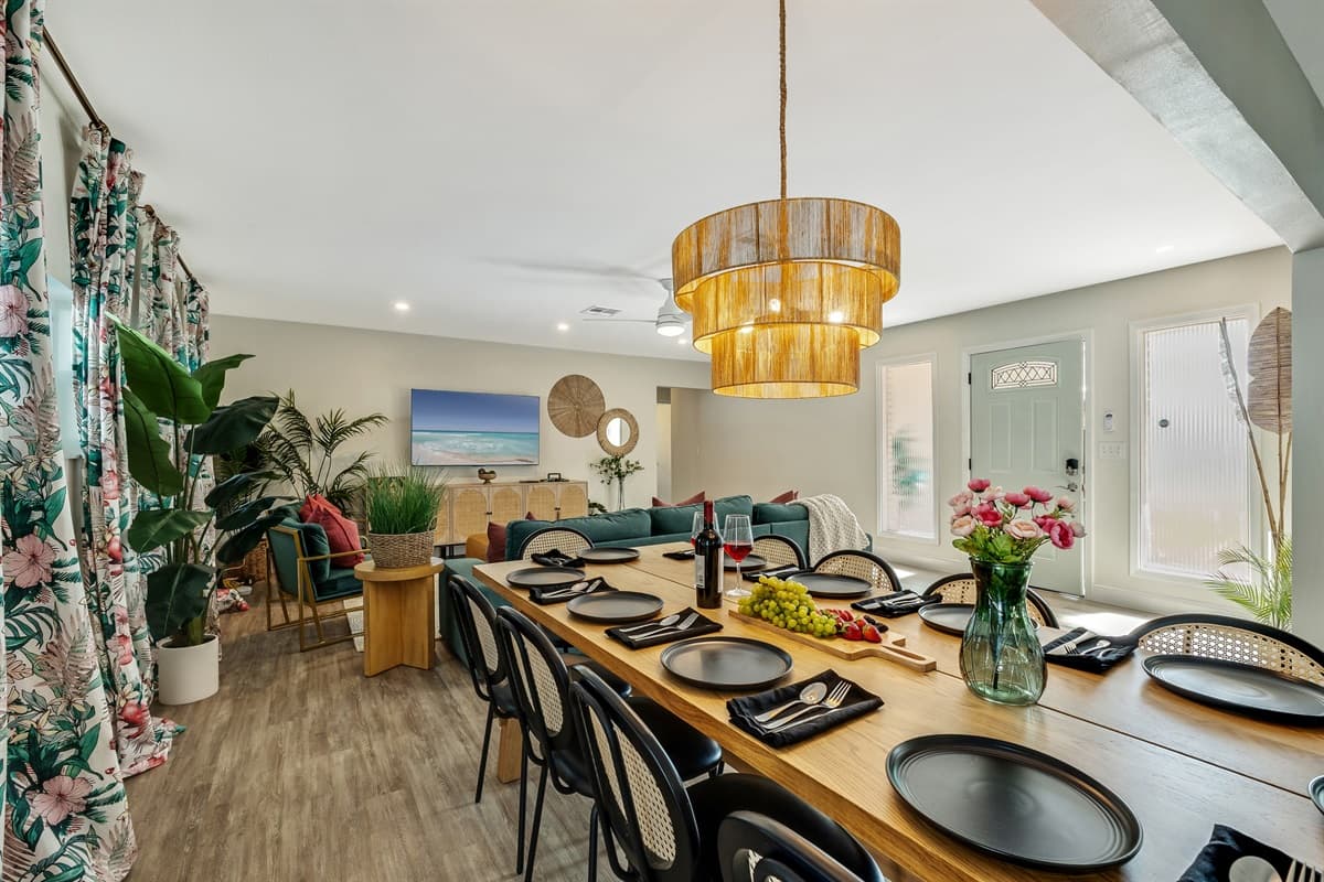The dining area is thoughtfully designed to blend seamlessly with the overall ambiance of the home, offering a perfect balance of style and comfort.