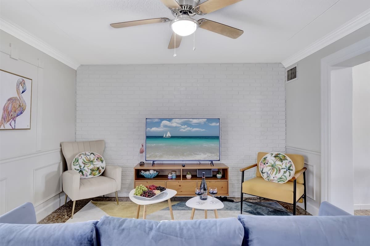 At the heart of this entertainment haven is a sleek, state-of-the-art smart TV.