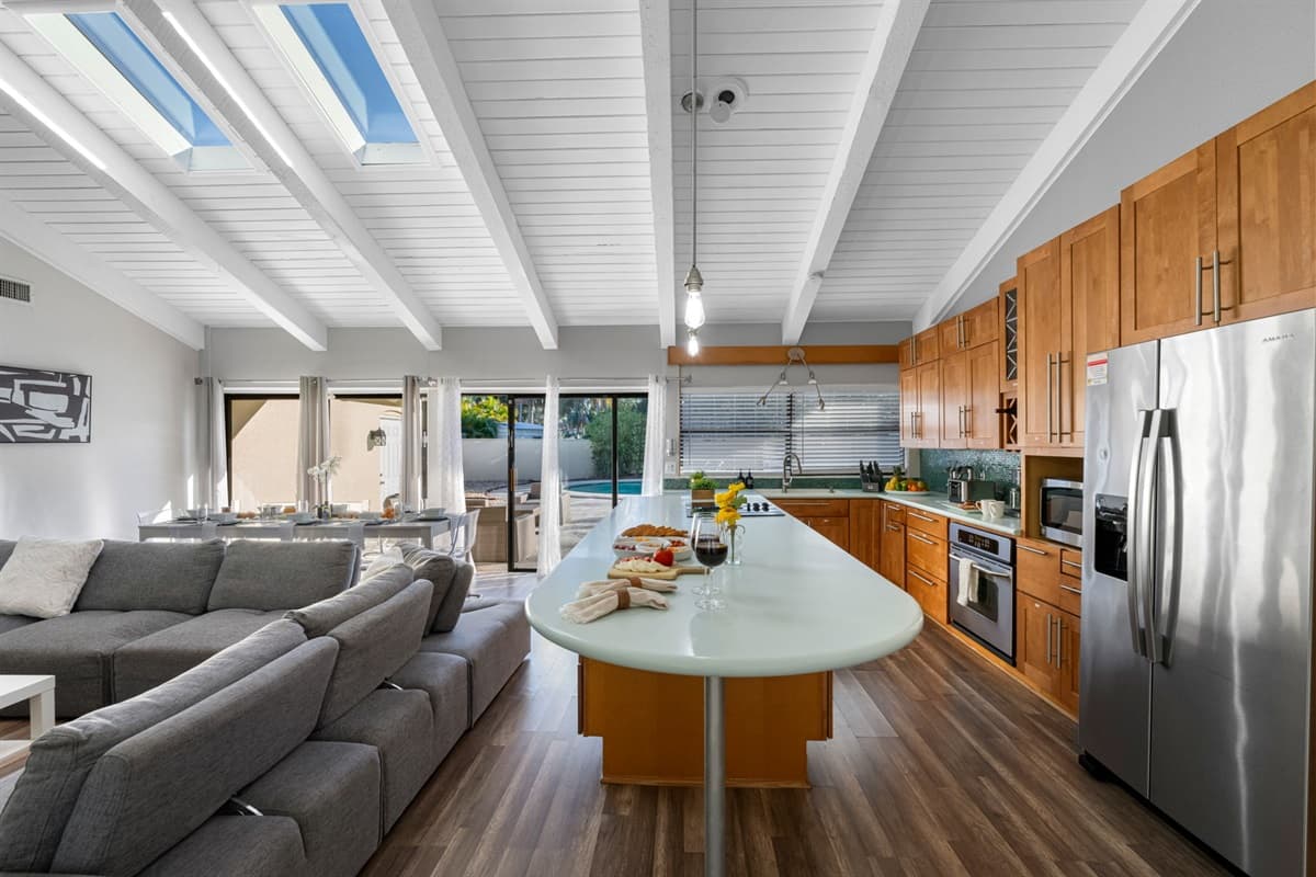 Bright, airy, and beautifully designed — this living area flows effortlessly into the dining and kitchen spaces for easy entertaining.