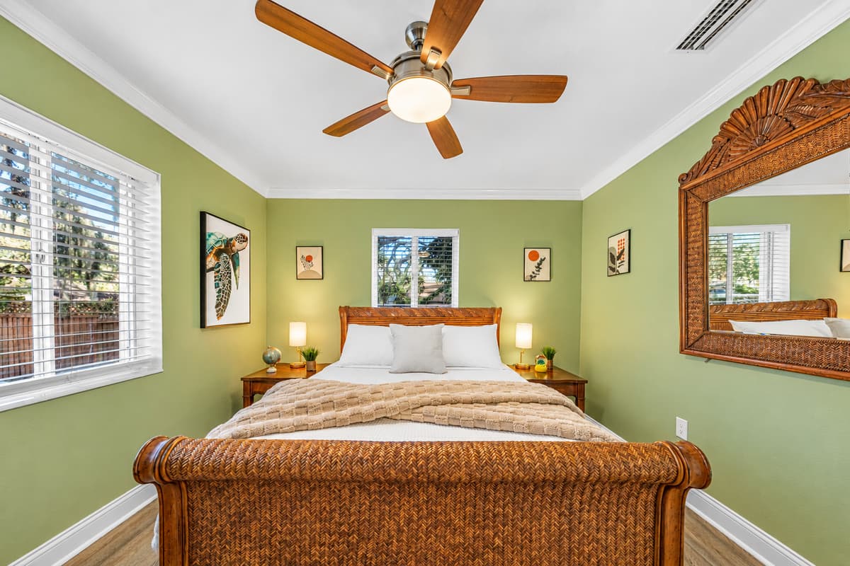 Unwind in this comfortable queen bedroom, complete with soft linens and charming details.