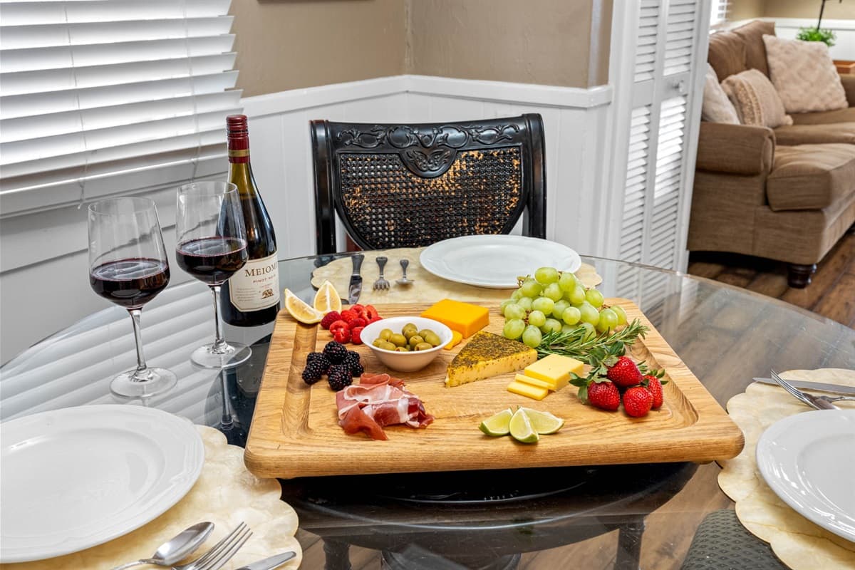 The kitchen is a culinary enthusiast's dream, boasting an abundance of counter space that makes meal preparation both effortless and enjoyable.