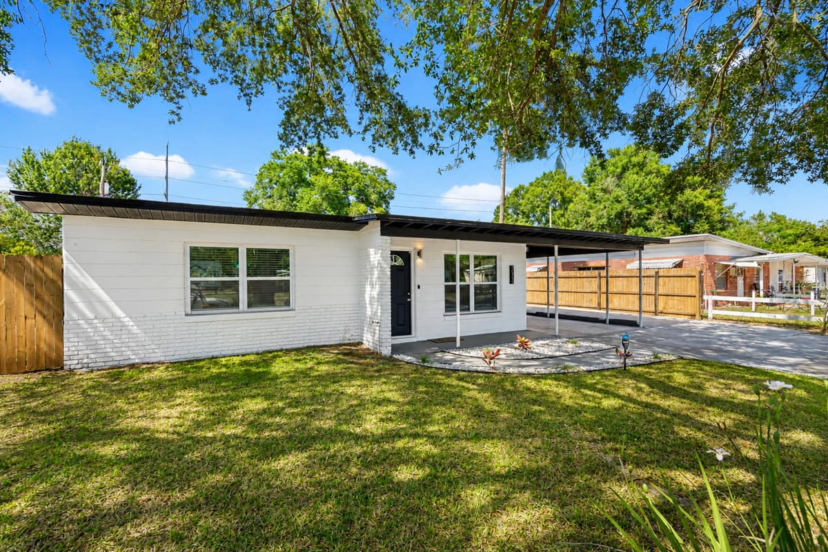 As you make your way up the spacious driveway, you'll notice the beautiful parking available for your convenience.