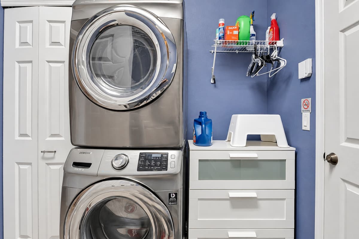 In our laundry room, you'll find a comprehensive set-up, including a full washer and dryer, as well as all the essential laundry supplies you need.