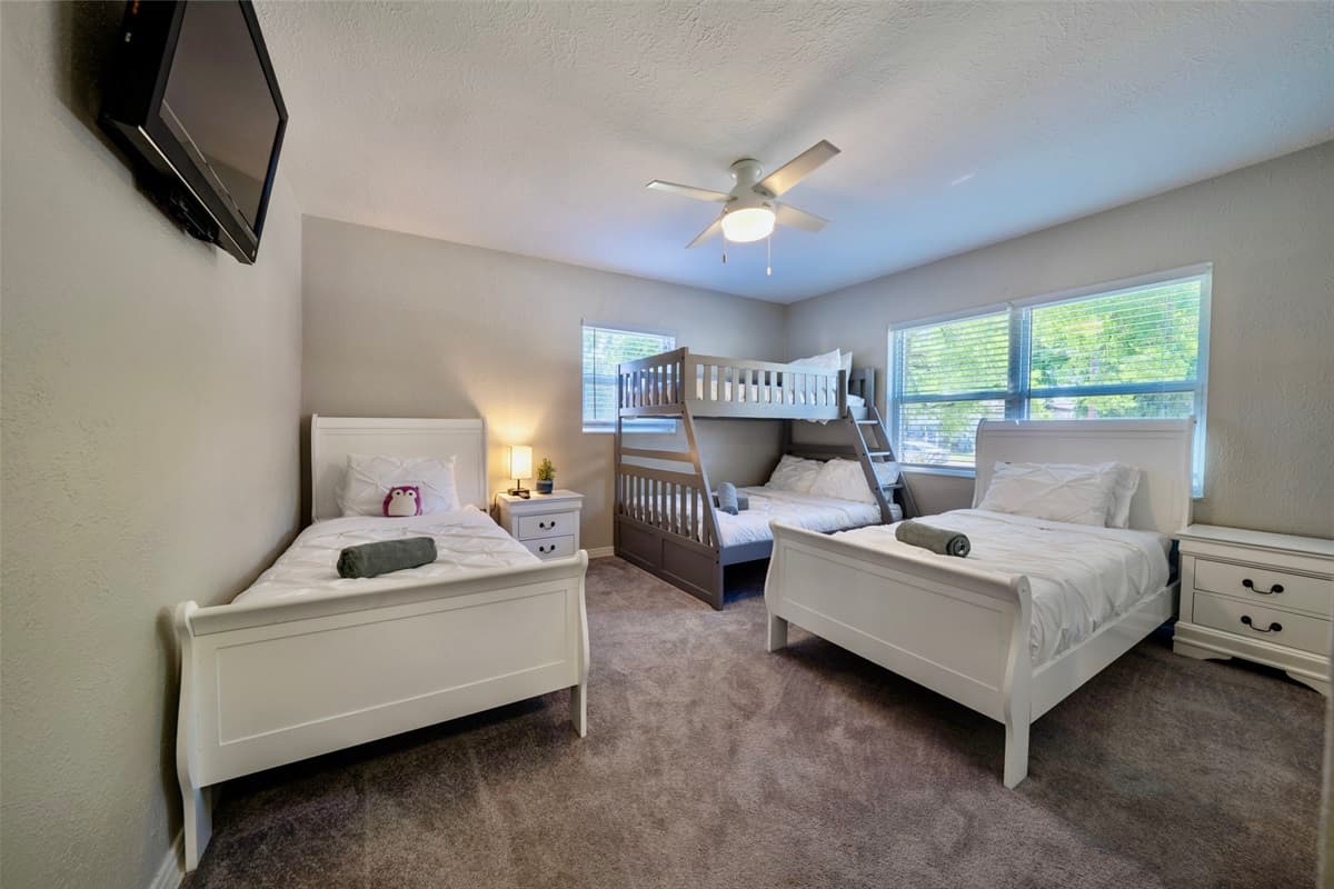 Our thoughtfully furnished bedroom ensures everyone enjoys a restful night's sleep with soft linens, plump pillows, and cozy duvets.