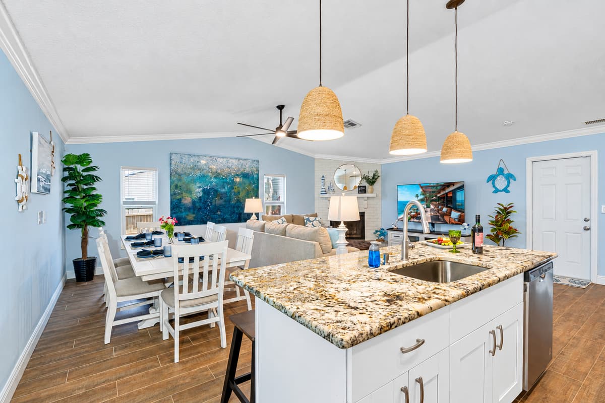 The sleek, contemporary countertops offer ample space for meal preparation and feature durable surfaces that are easy to clean and maintain.