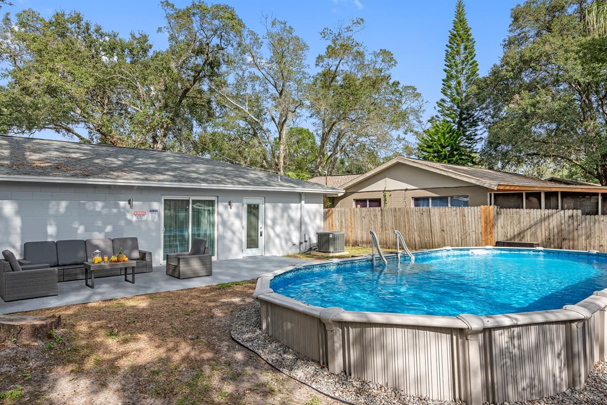 Have a wonderful time during your stay with family and friends while swimming in this stunning heated pool! If you are interested in this property, send us a message!
