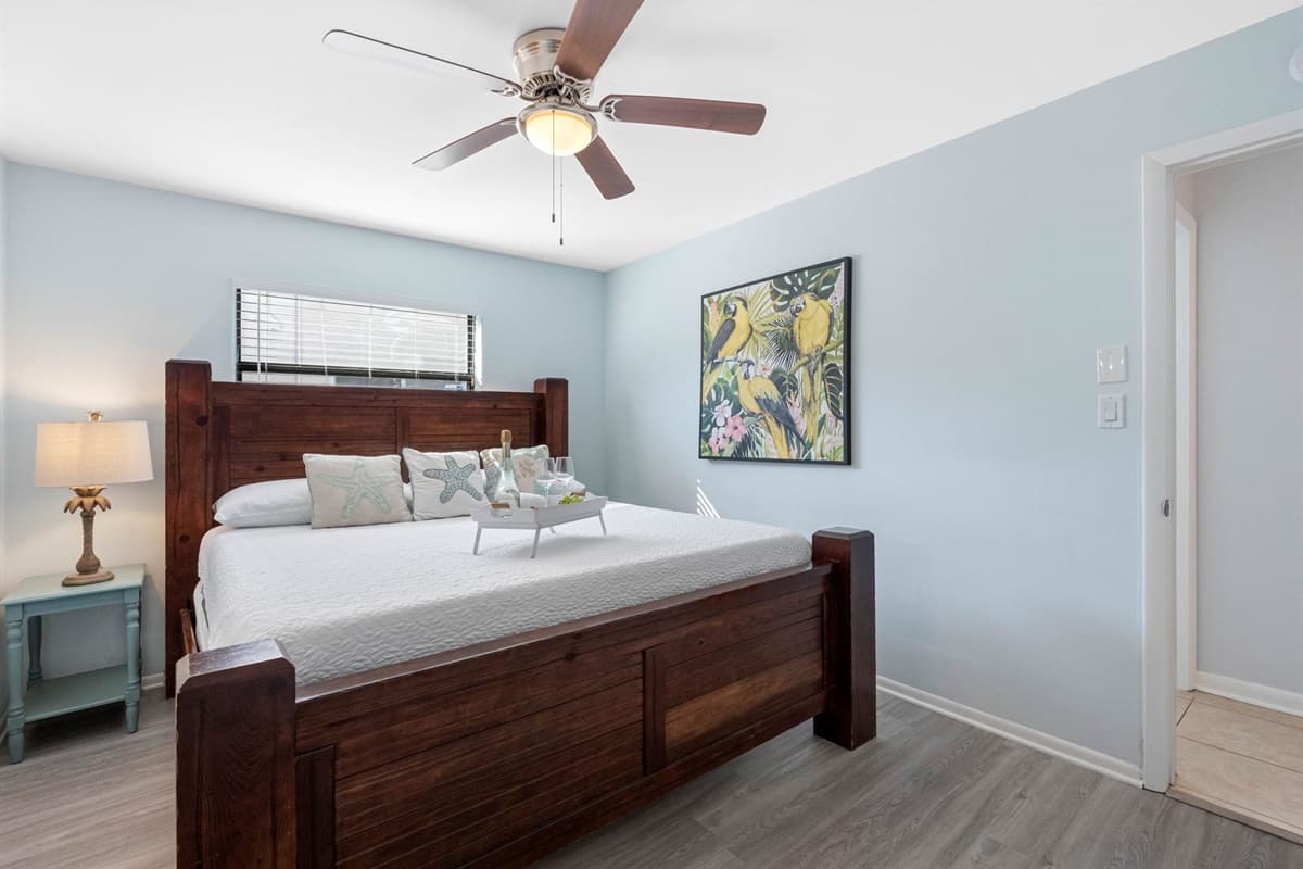 This inviting room is thoughtfully decorated in soft, calming tones, the space radiates tranquility, making it a serene retreat after a day of activities.