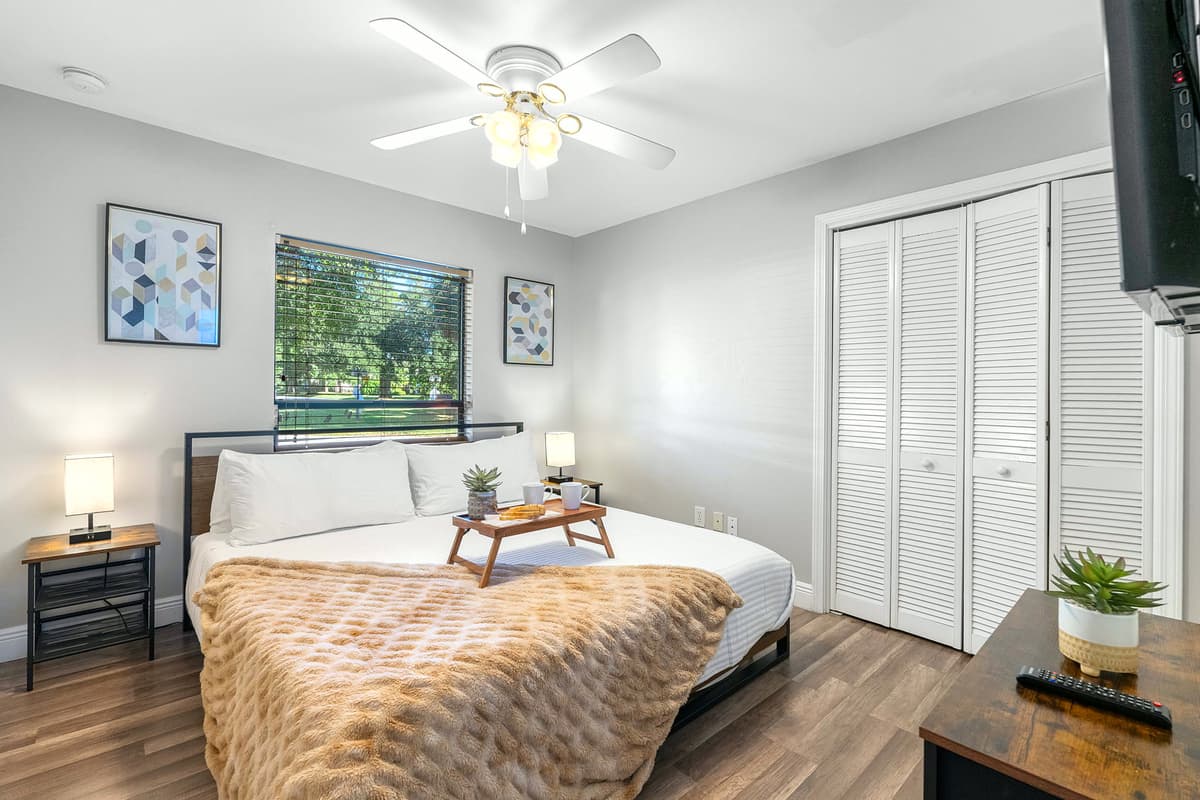 This bright and comfortable room features a luxurious king-size bed and modern décor.