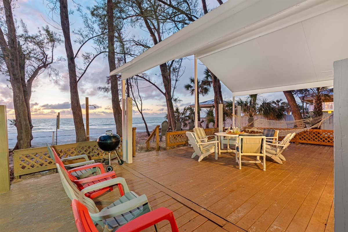 For ultimate relaxation, the beach is equipped with comfortable lounge chairs, ideal for sunbathing or unwinding while listening to the sound of the waves.