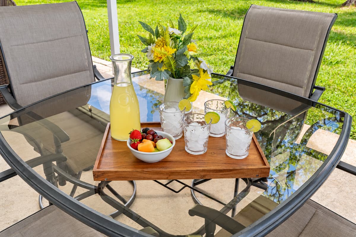 This inviting outdoor setup is ideal for slow mornings, casual conversations, or refreshing afternoon breaks in the Florida sunshine.