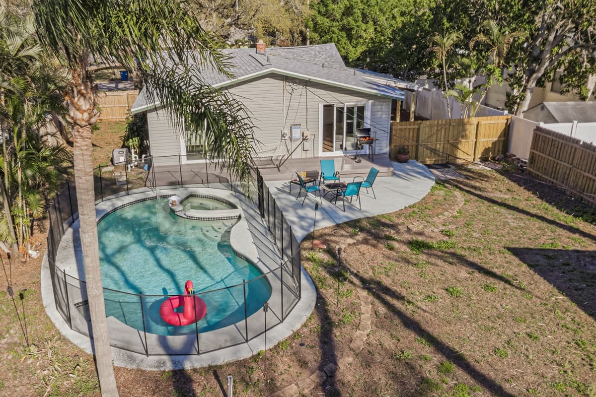 Private backyard oasis featuring a private pool and spacious outdoor area to relax and unwind.