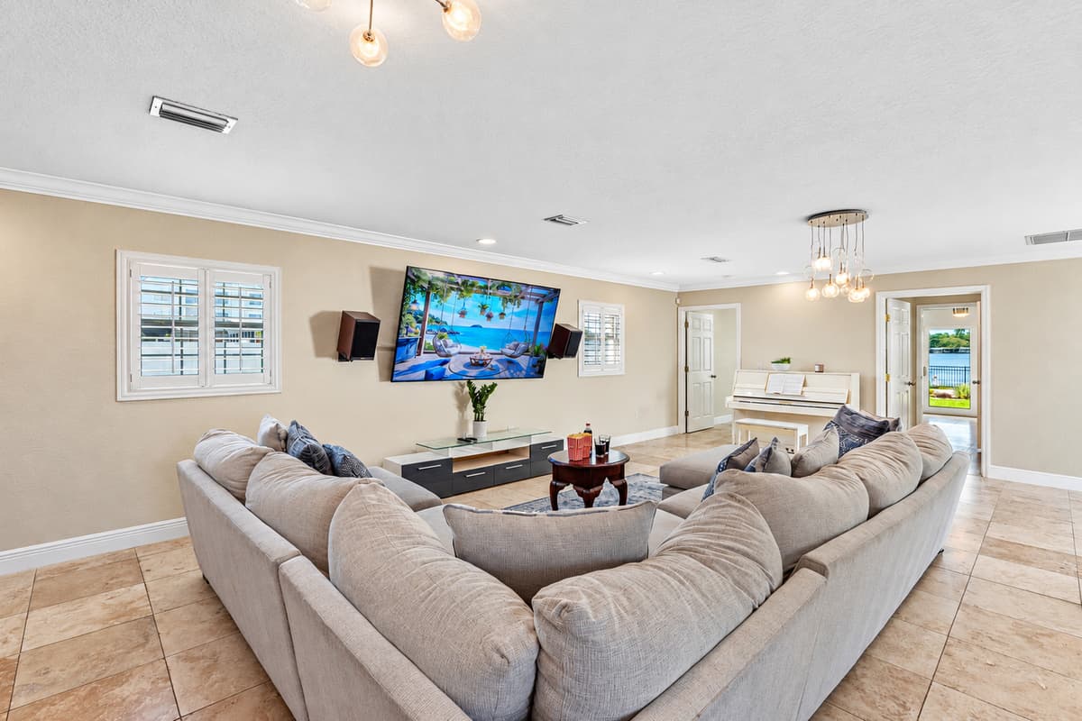 At the center of the room is a large smart TV, equipped with access to popular streaming platforms.