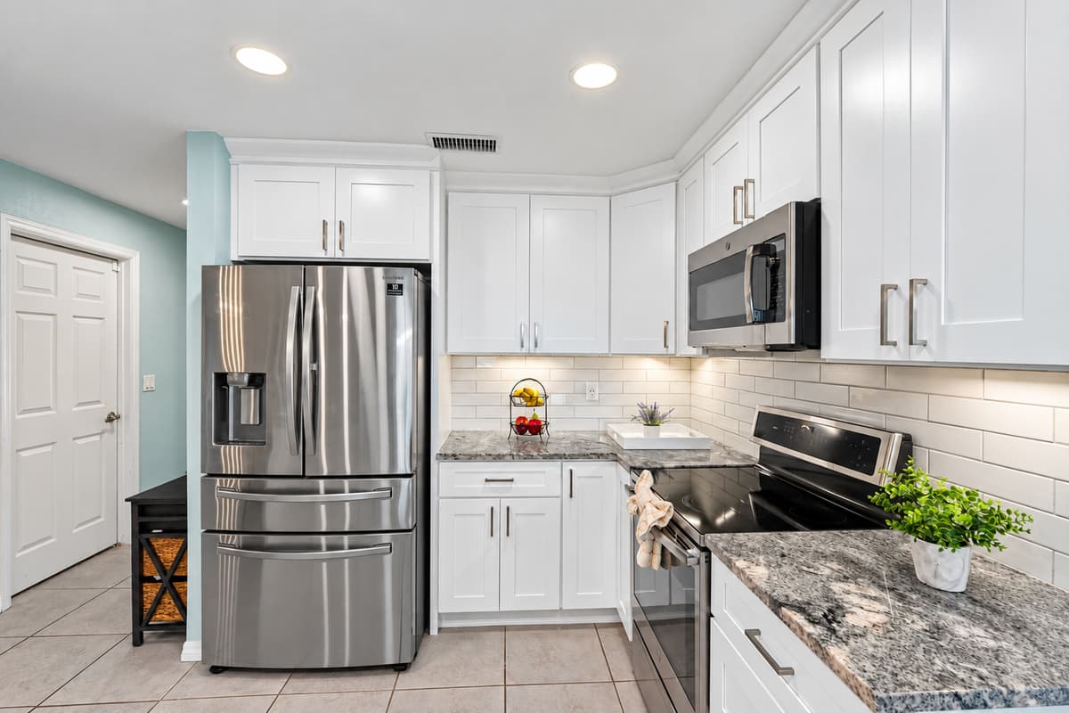 From stainless steel appliances to the chic pendant lighting, every detail was designed with comfort and convenience in mind.
