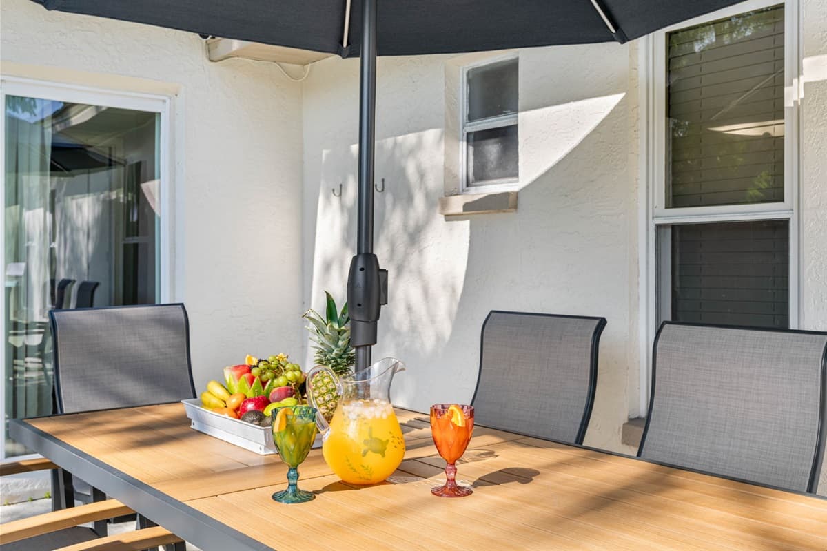 Whether it's a family breakfast as the morning sun dances on the water or an evening barbecue with friends, this inviting area offers ample seating for your group.