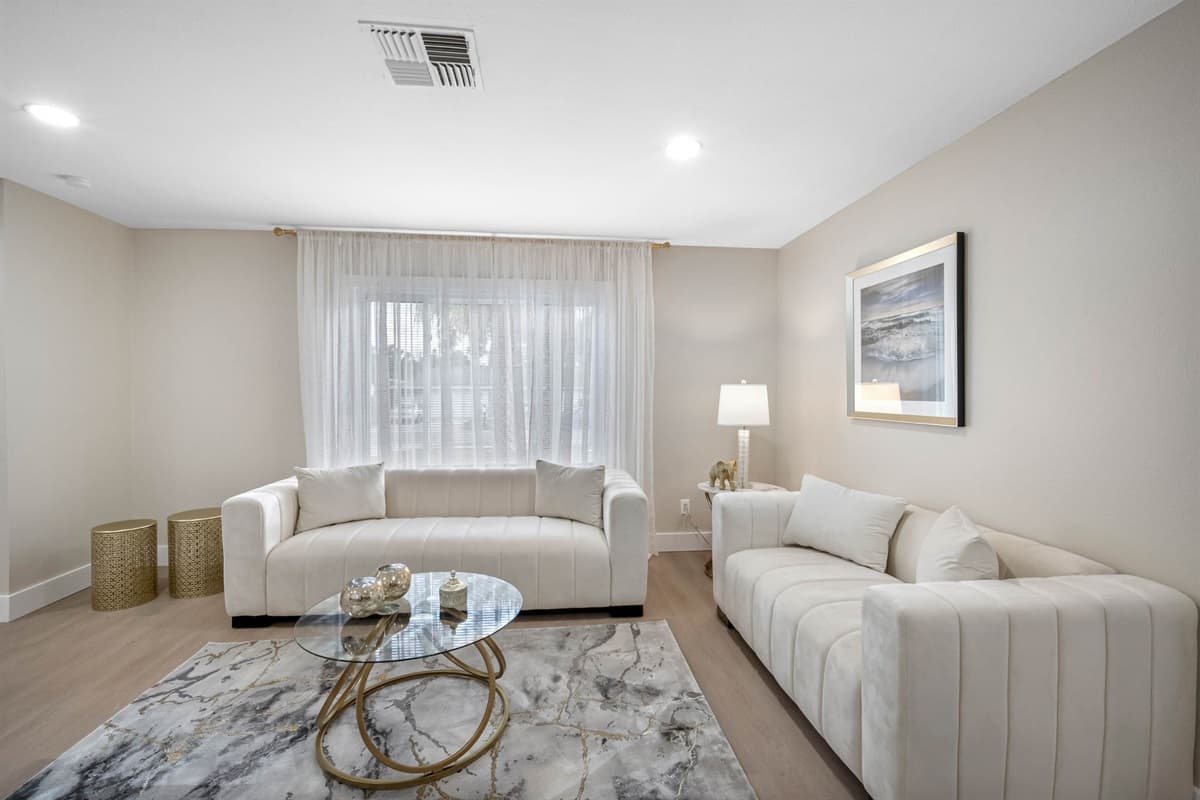 Designed with relaxation in mind, this airy space combines modern elegance with beach-inspired warmth.