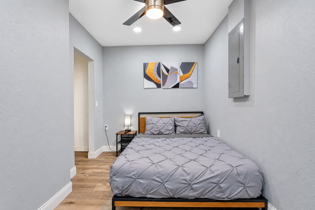 Beautiful bedroom with a queen-sized bed, drawers for storage and smart TV. Sleep comfortably after a long day of travel from your home to your home away from home. Like what you see? Send us a message
