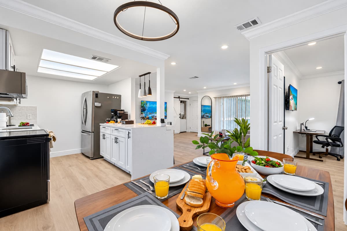 Gather around this cheerful dining space, filled with natural light and cozy vibes for every meal.