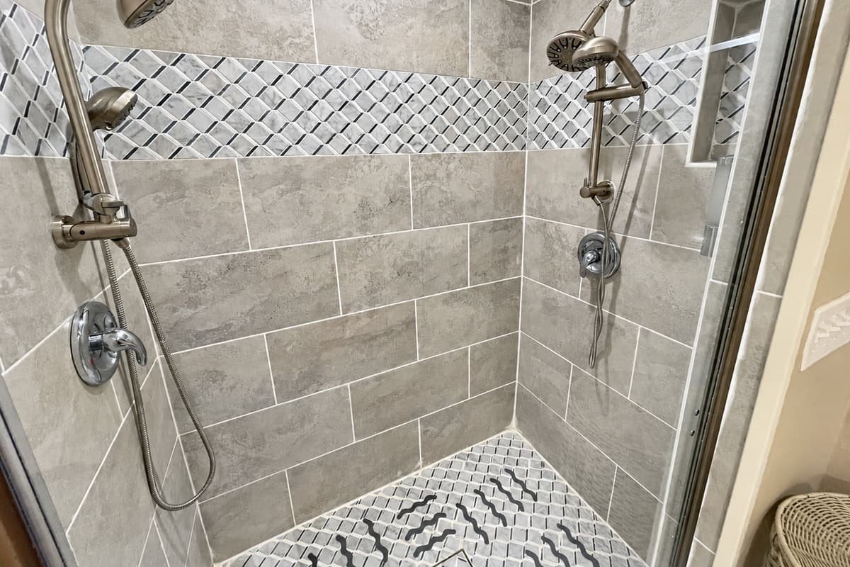 The walk-in shower is both accessible and functional, making it the perfect space to rejuvenate after a long day of activities.