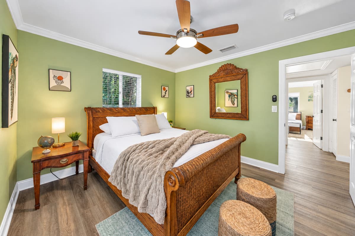 Designed for relaxation, this bedroom features a plush queen bed and a warm, homey feel.