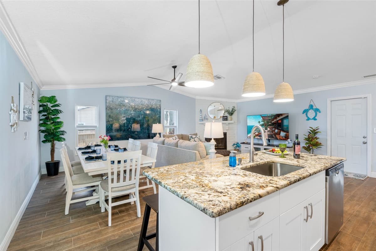 The sleek, contemporary countertops offer ample space for meal preparation and feature durable surfaces that are easy to clean and maintain.