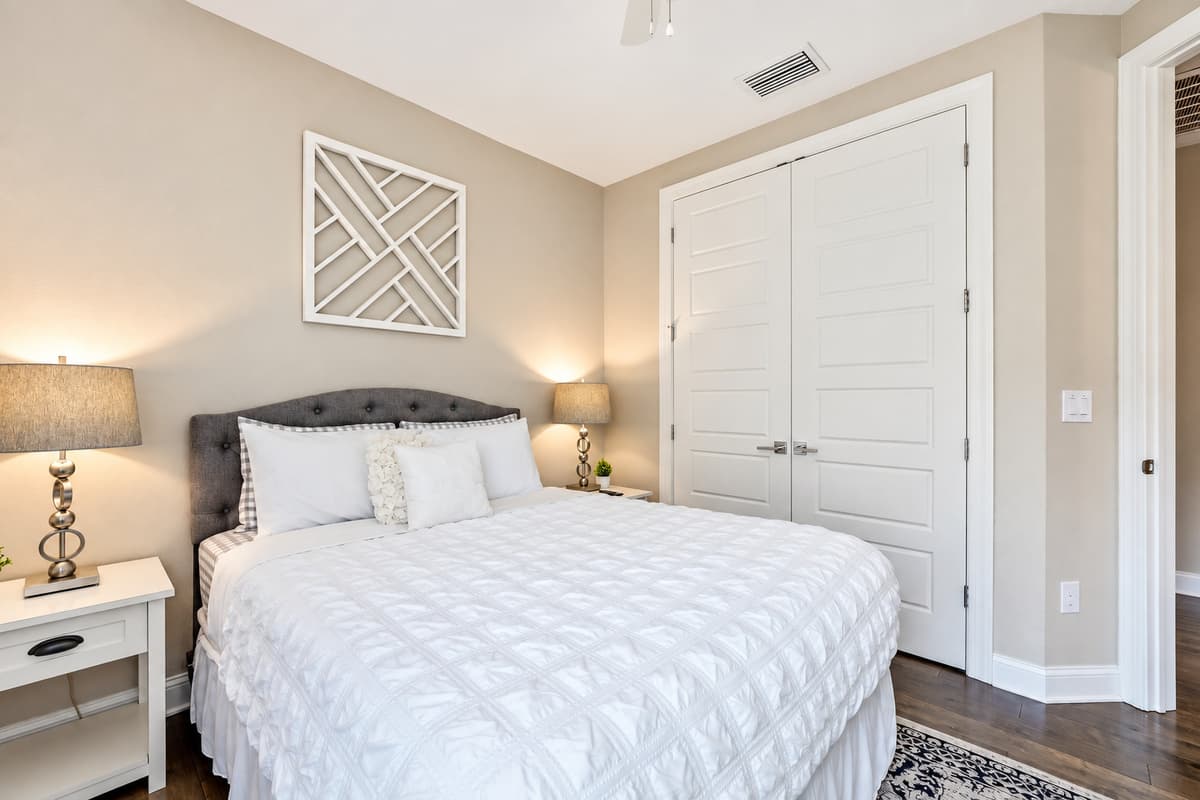 This inviting retreat features a sumptuous king-size bed adorned with plush linens, ensuring a restful and rejuvenating night's sleep.
